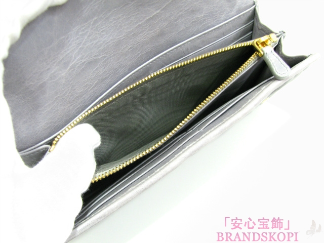 miu miu（ミュウミュウ）ＺＩＰ長財布/グレー(金具：ゴールド)/型押しレザー(5M1109)
