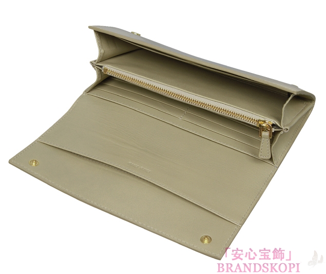 ミュウ ミュウ　2011年春夏新作VERNICE FIOCCOリボン付 二つ折り長財布 5M1109 3CJ F0482